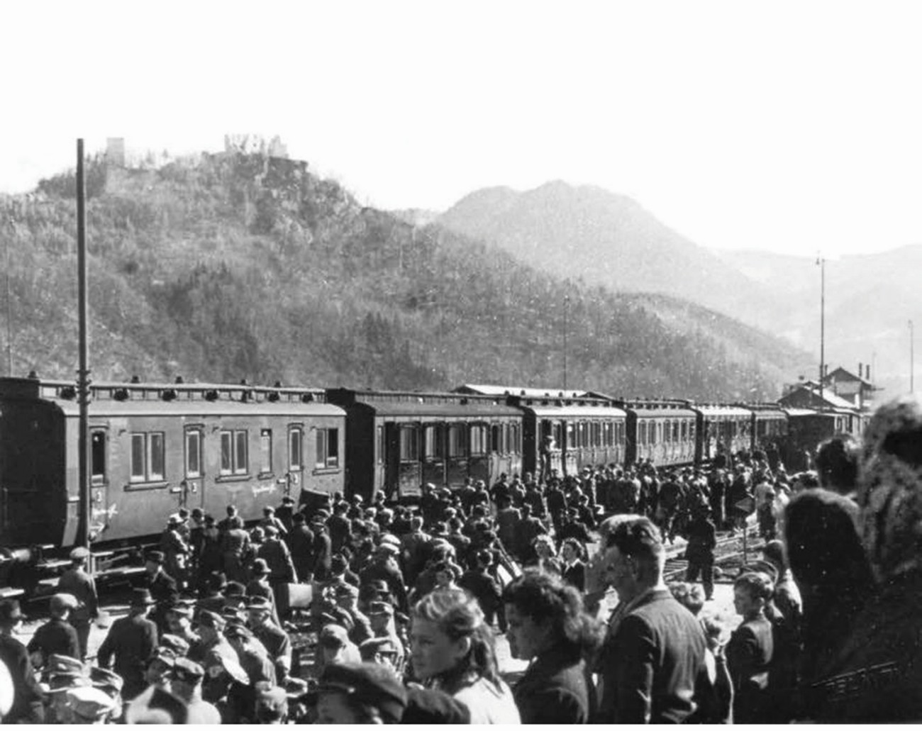 Young Slovene boys, forced to conscript into the German Army, are gathering at the Celje railway station to travel to the theatres of war throughout Europe. Source: the book S puško in knjigo/With a Rifle and a Book (author Božo Repe). Muzej novejše zgodovine Celje.